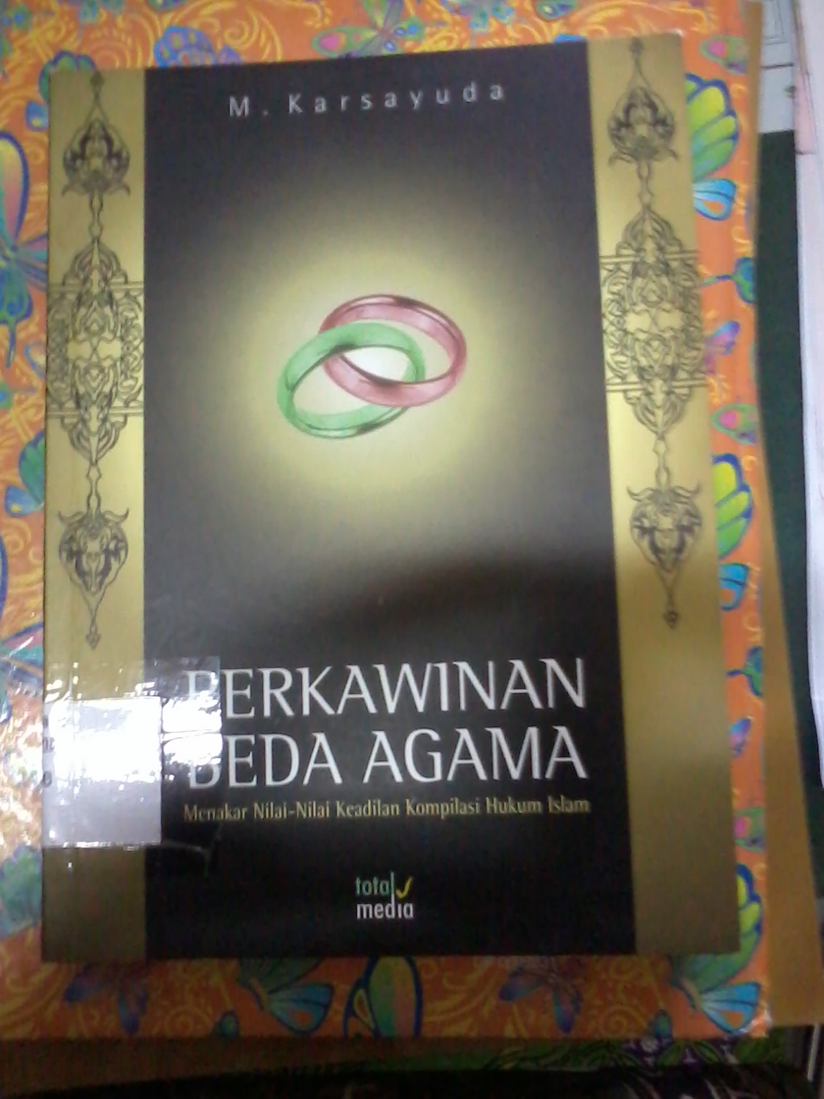 PERKAWINAN BEDA AGAMA  ; Menakar Nilai-Nilai keadilan Kompilasi Hukum Islam